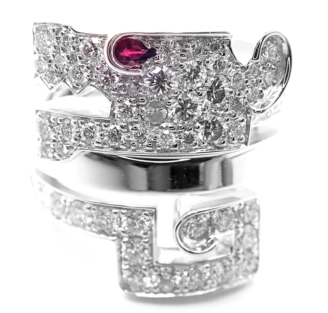 Authentic! Cartier Le Baiser Du Dragon 18k White Gold Diamond Ruby Ring Paper: Authentic! Cartier Le Baiser Du Dragon 18k White Gold Diamond Ruby Ring Paper About This Piece: This ring comes with Cartier box and a service paper from a Cartier store. Metal: 18k White Gold Size: E