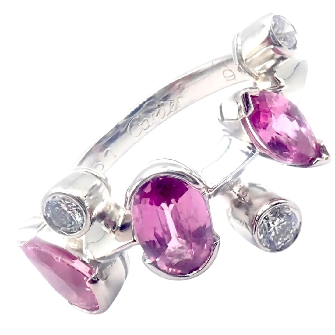 Authentic! Cartier Meli Melo Platinum Diamond Pink Sapphire Band Ring Cert.: Authentic! Cartier Meli Melo Platinum Diamond Pink Sapphire Band Ring Cert. About This Piece: Cartier’s Meli Melo band ring in platinum enthralls with a playful scattering of sparkling diamonds