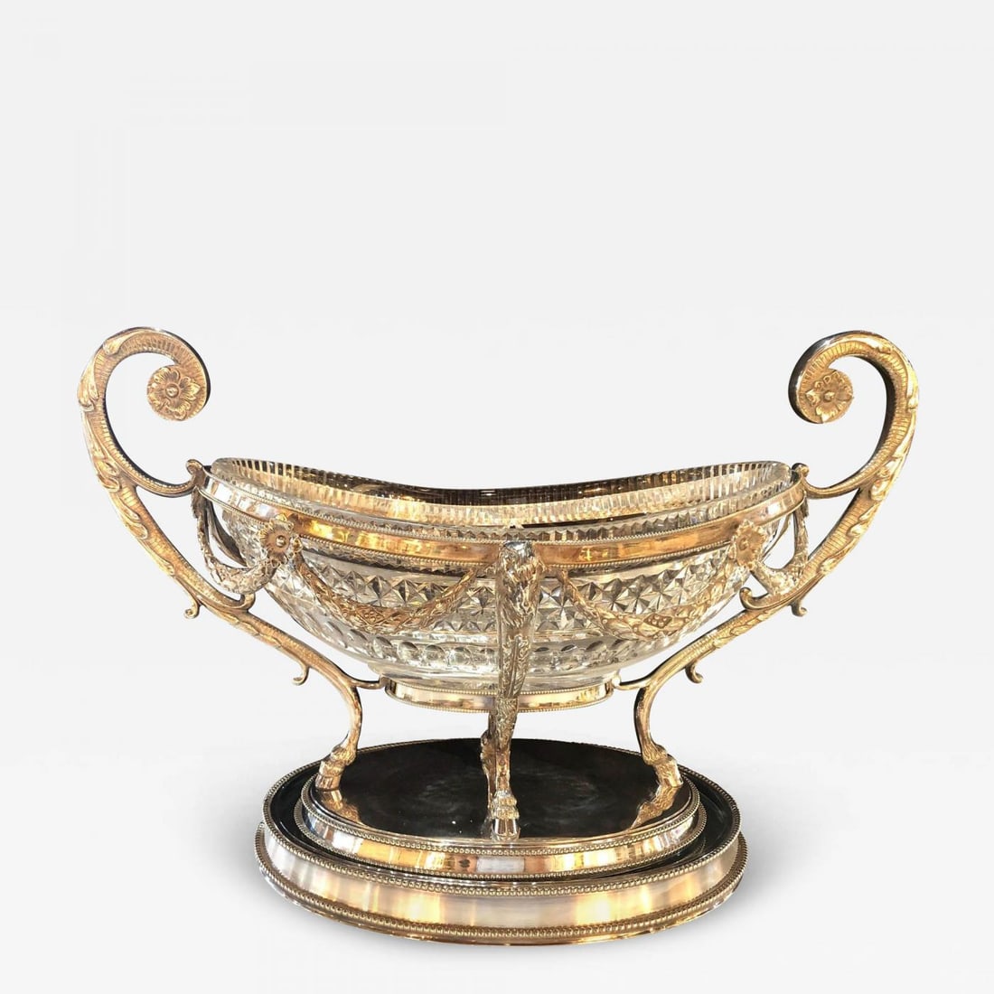 George III Style Silver Plated Oval Center Bowl with Cut Glass Liner: Title: George III Style Silver Plated Oval Center Bowl with Cut Glass Liner Description: Spectacular 19th century George III style silver plated oval center bowl with cut glass liner on a mirrored pla
