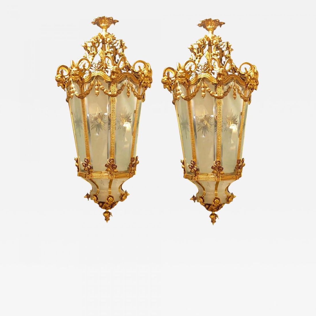 Pair of Monumental Louis XVI Style Doré Bronze Large Rams Head Lanterns: Title: Pair of Monumental Louis XVI Style Doré Bronze Large Rams Head Lanterns Description: Pair of Louis XVI style monumental doré bronze ram's head etched glass lanterns. These