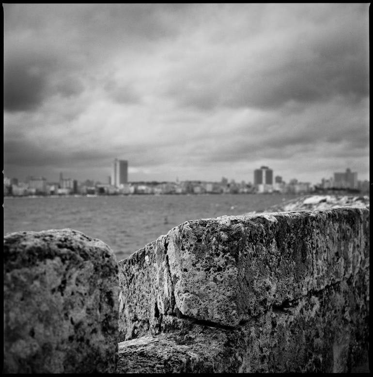 Dramatic view of Havana from El Moro Fort, Cuba - Silver Gelatin: Title: Dramatic view of Havana from El Moro Fort, Cuba - Silver Gelatin Photograph - Limited Edition of 10 Artist: Paul Cooklin Origin: United Kingdom Medium: Photography, Gelatin on Paper Dimensions: