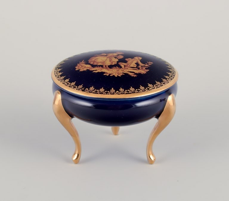 Limoges, France. Five pieces of porcelain consisting of a lidded jar, two vases, a lidded - 4