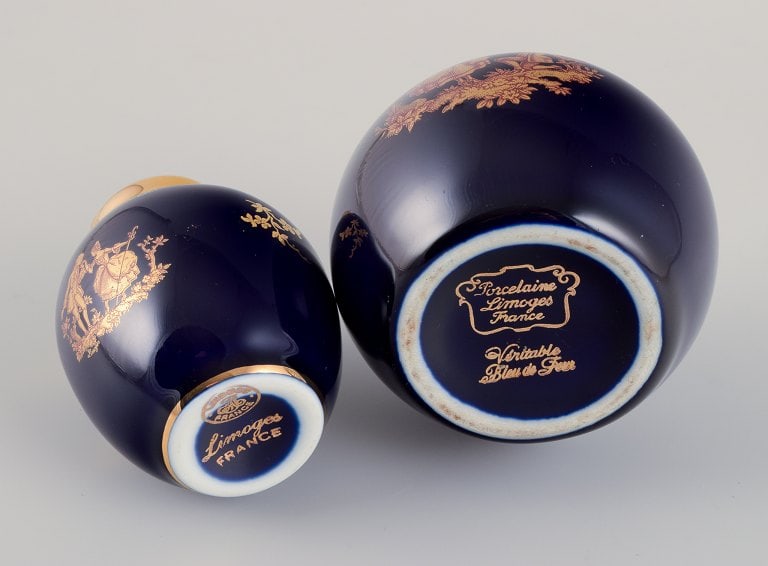 Limoges, France. Five pieces of porcelain consisting of a lidded jar, two vases, a lidded - 9