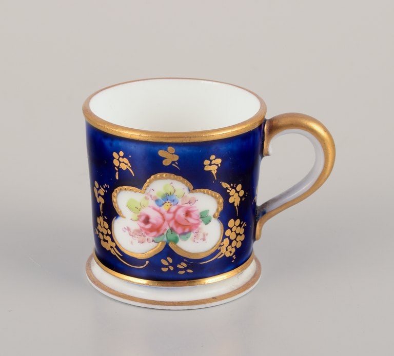 Three pieces of French and English porcelain including a Royal Crown Derby miniature cup, a - 4