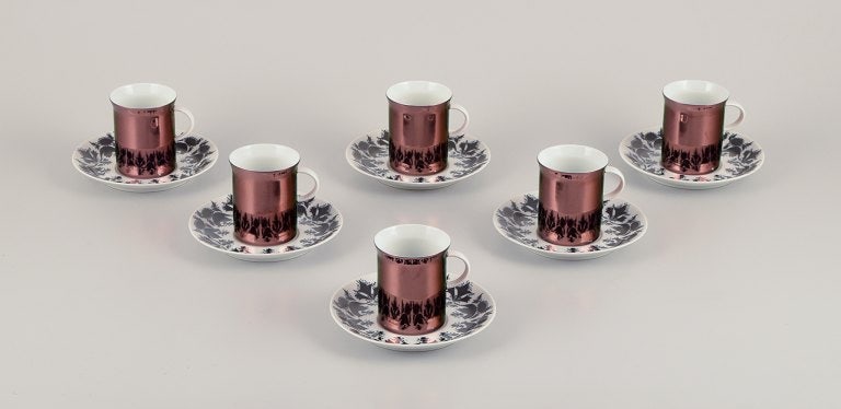 Bjørn Wiinblad (1918-2006) for Rosenthal, Germany. A set of six "Berlin Hilton" porcelain: Title:Bjørn Wiinblad (1918-2006) for Rosenthal, Germany. A set of six "Berlin Hilton" porcelain demitasse cups with saucers. Glossy copper-colored decoration. Description:Bjørn Wiinblad (191
