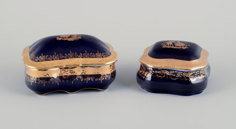 Limoges, France. Two lidded porcelain jars adorned with 22-karat gold leaf and featuring a beautiful (1 of 9)