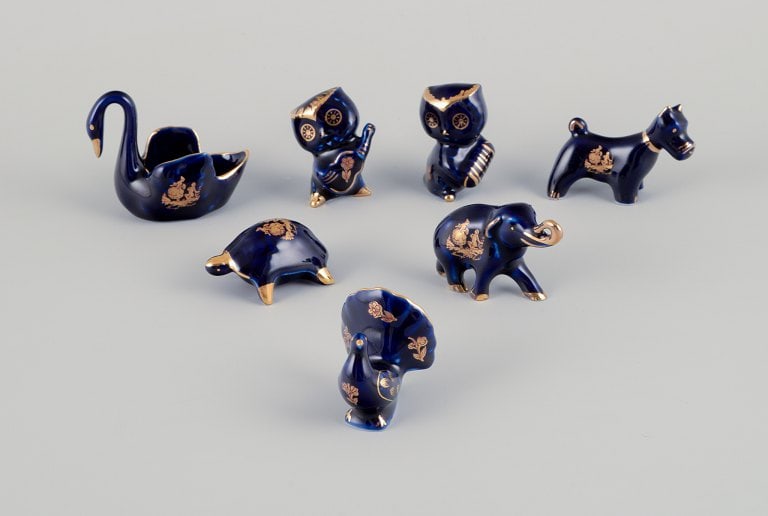 Limoges, France. Seven miniature porcelain animals, decorated with 22-karat gold leaf and a (1 of 9)