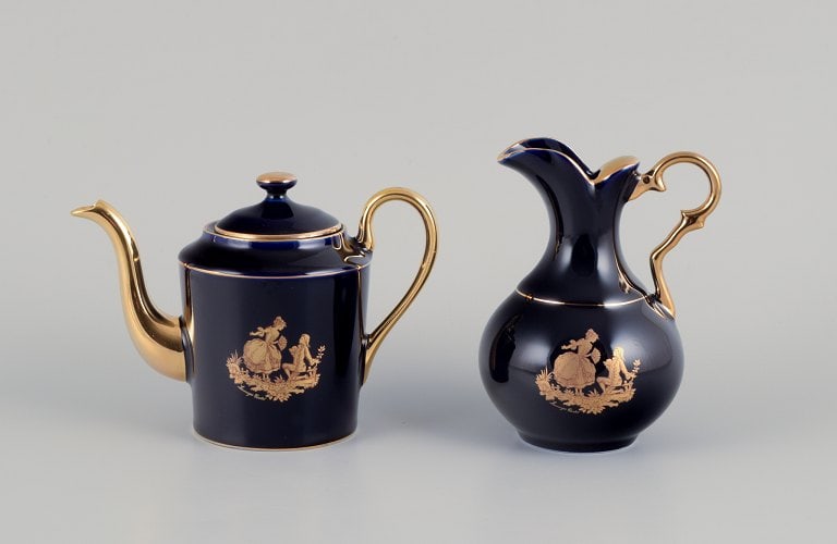 Limoges, France. Miniature Coffee pot and water jug in porcelain, decorated with 22-karat gold leaf (1 of 9)