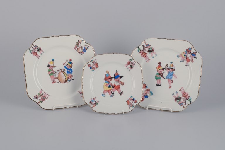 Limoges Porcelaine, France. Three porcelain plates with motifs of child musicians. (1 of 9)