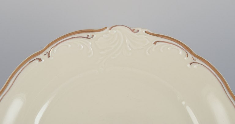 KPM, Poland. A set of six porcelain lunch plates. Cream-colored with gold rim decoration. - 3