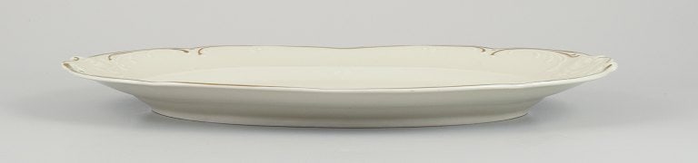 KPM, Poland. Two large oval porcelain serving platters. Cream-colored with gold rim decoration. - 3
