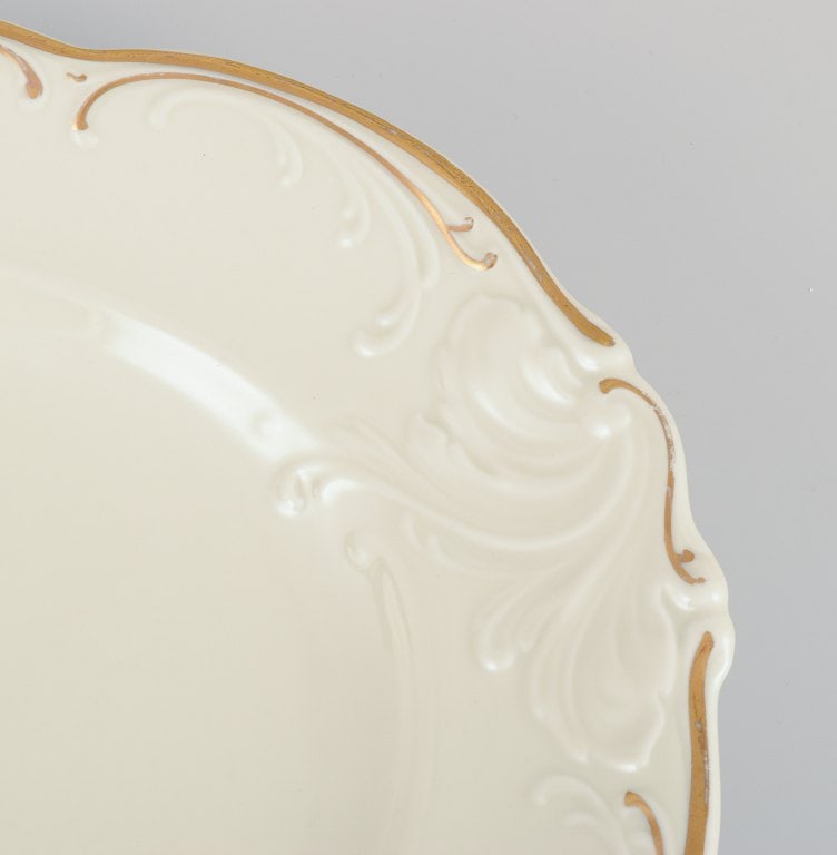 KPM, Poland. Two large oval porcelain serving platters. Cream-colored with gold rim decoration. - 4