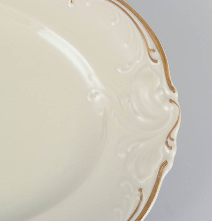 KPM, Poland. Two large oval porcelain serving platters. Cream-colored with gold rim decoration. - 8
