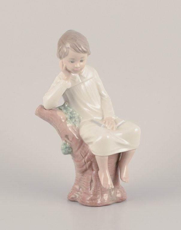 Lladro, Spain. Porcelain figurine of a girl sitting on a tree stump. (1 of 9)
