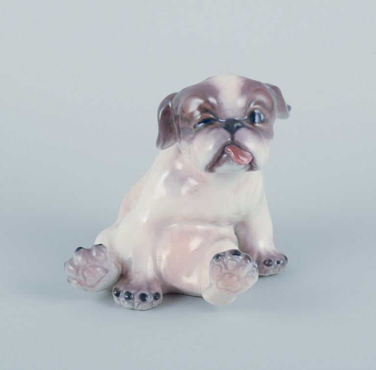 Dahl Jensen, porcelain figurine of a Pekingese puppy. (1 of 6)