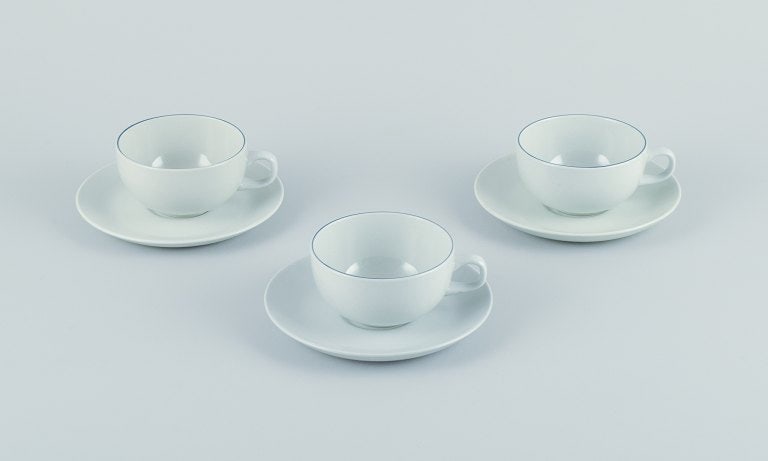 Three Aluminia/Royal Copenhagen blue line coffee cups and saucers. Designed by Grethe Meyer.: Title:Three Aluminia/Royal Copenhagen blue line coffee cups and saucers. Designed by Grethe Meyer.Description:Three Aluminia/Royal Copenhagen blue line coffee cups and saucers. Designed by Grethe