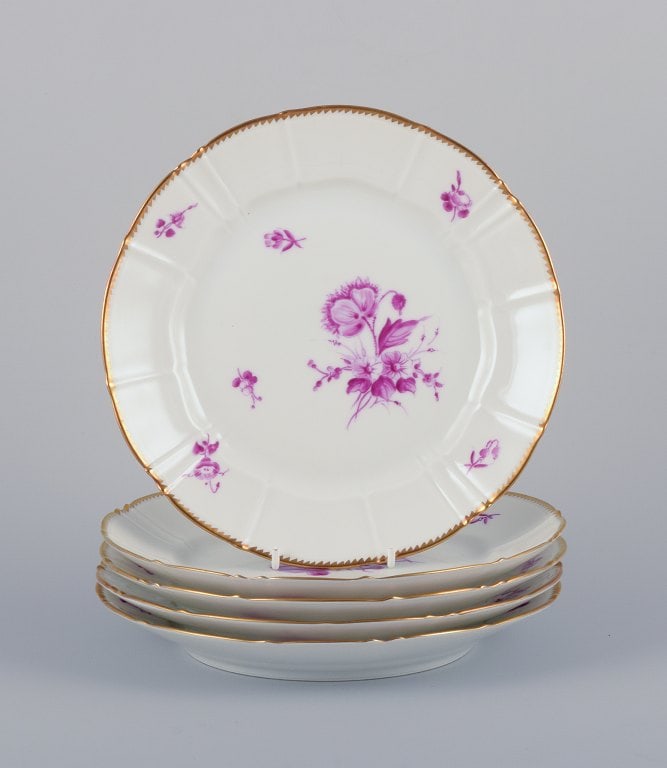 Bing & Grøndahl, Denmark. A set of five luncheon plates with flower decorations in purple and: Title:Bing & Grøndahl, Denmark. A set of five luncheon plates with flower decorations in purple and gold trim. Hand-painted.Description:Bing & Grøndahl, Denmark. A set of five luncheon
