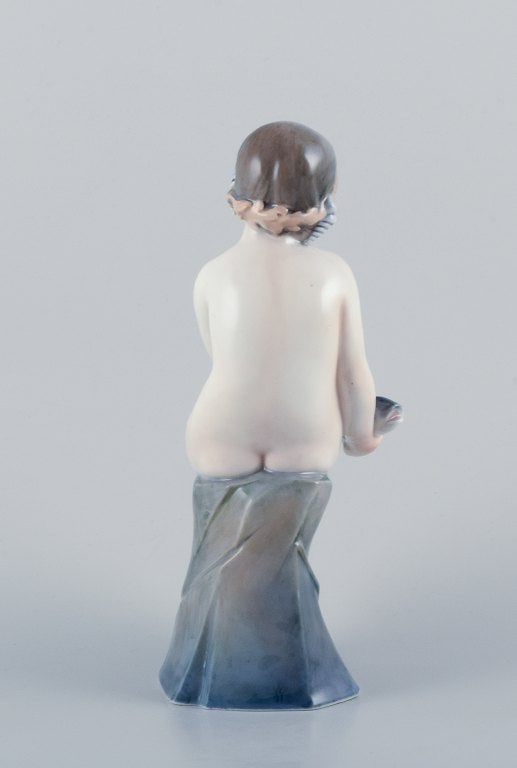 Royal Copenhagen, rare porcelain figurine of a mermaid holding fish in her hands. - 6