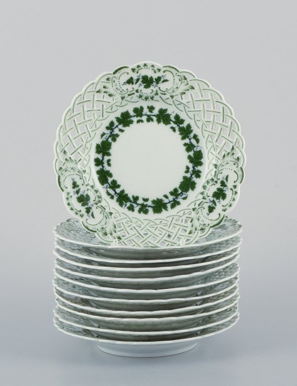 Meissen, Germany, Green Ivy Vine, a set of eleven small plates with reticulated edges. Hand-painted. (1 of 4)