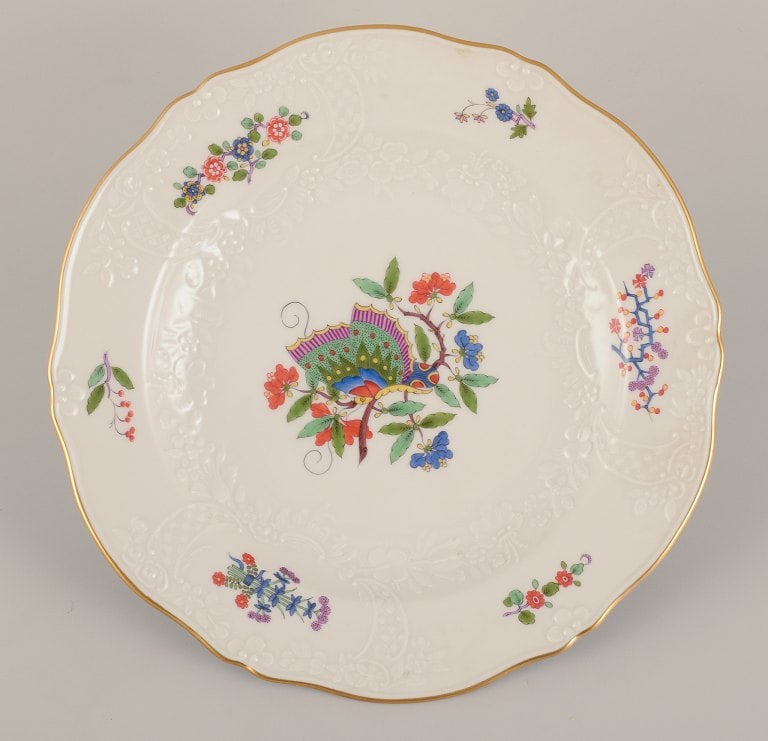 Meissen, Germany. Hand-painted dinner plate featuring a butterfly on a branch and polychrome flower (1 of 5)