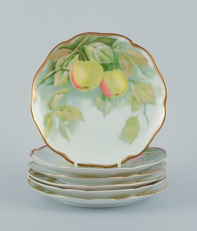 Rosenthal, Germany. A set of six porcelain plates with various fruit motifs. Gold rim. (1 of 8)