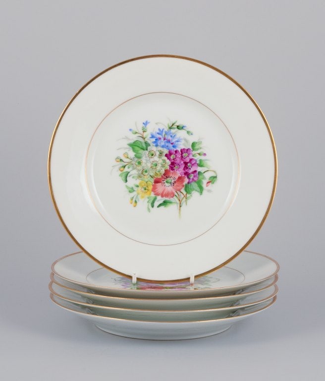 Bing & Grøndahl, Denmark. A set of five porcelain plates hand-painted with various polychrome (1 of 7)