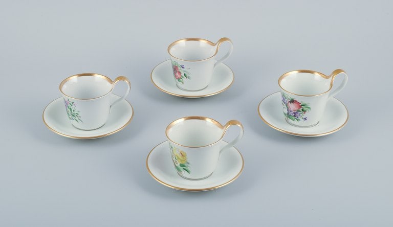 Bing & Grøndahl, a set of four antique coffee cups with high handles and saucers.: Title:Bing & Grøndahl, a set of four antique coffee cups with high handles and saucers.Description:Bing & Grøndahl, a set of four antique coffee cups with high handles and saucers.