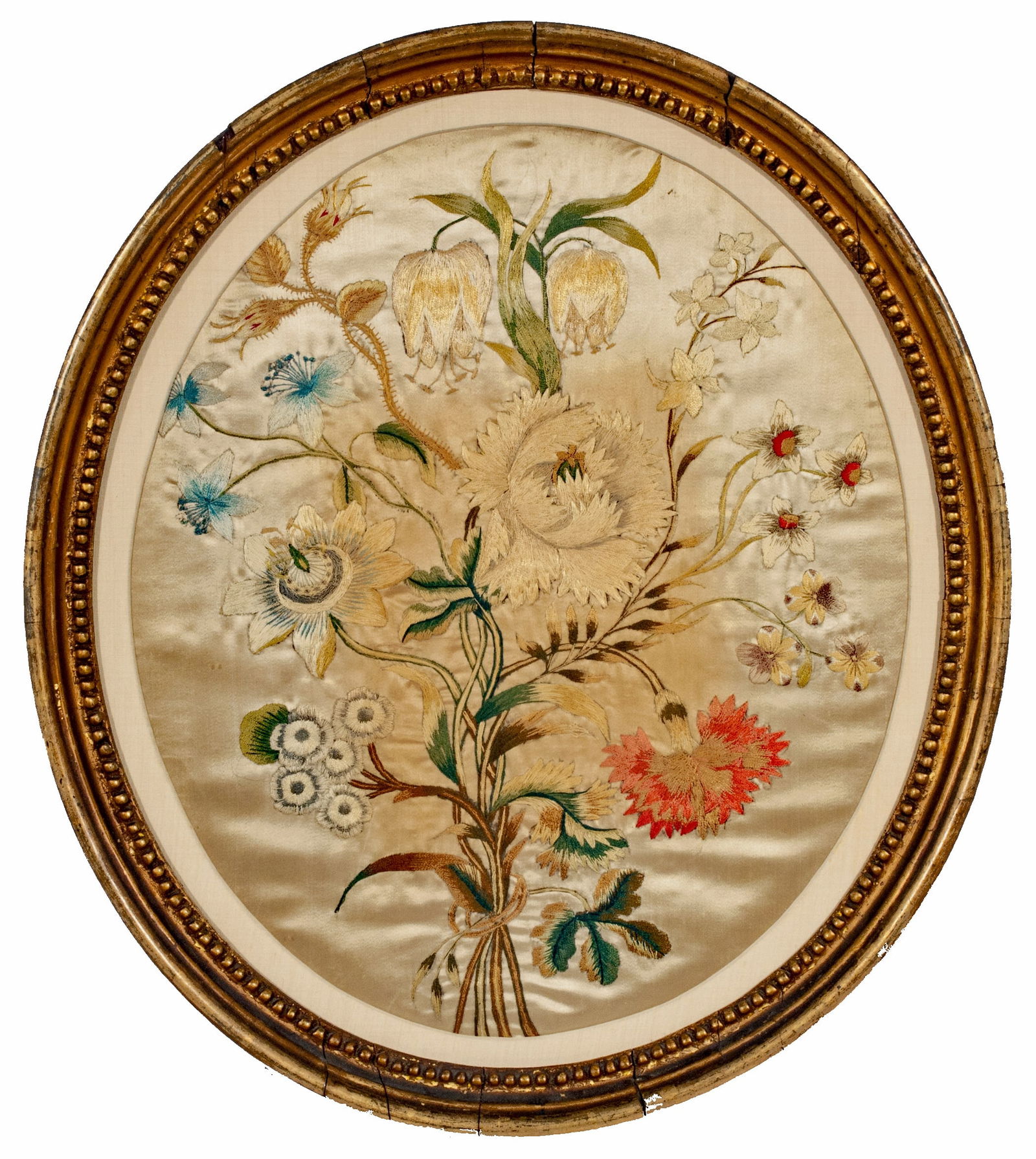 PAIR OF SILK EMBROIDERED PICTURES - C. 1800: Pair of beautifully embroidered flowering motifs in period oval frames c. 1800. Note: The condition is excellent and the colors are strong, with some darkening of the background silk. 18 x 16 inches