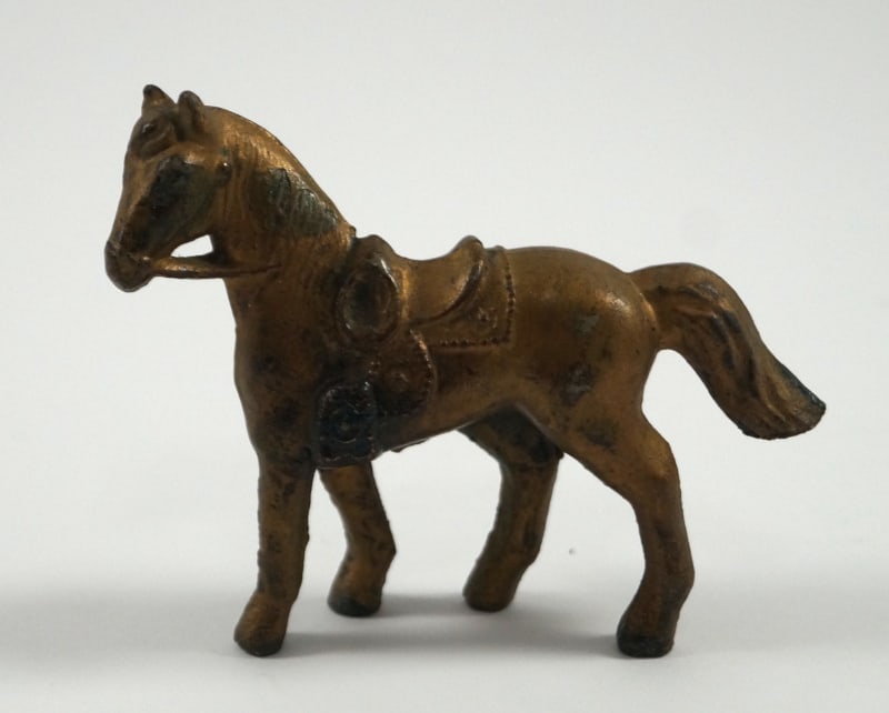 Antique Small Saddle Horse Cast Iron Toy: Title: Antique Small Saddle Horse Cast Iron Toy Dimension: 2 5/8” tall x 3 3/8” long. Date: Ca. 1930’s-40’s. Additional Information: Exceptional Small Saddle Horse cast iron An