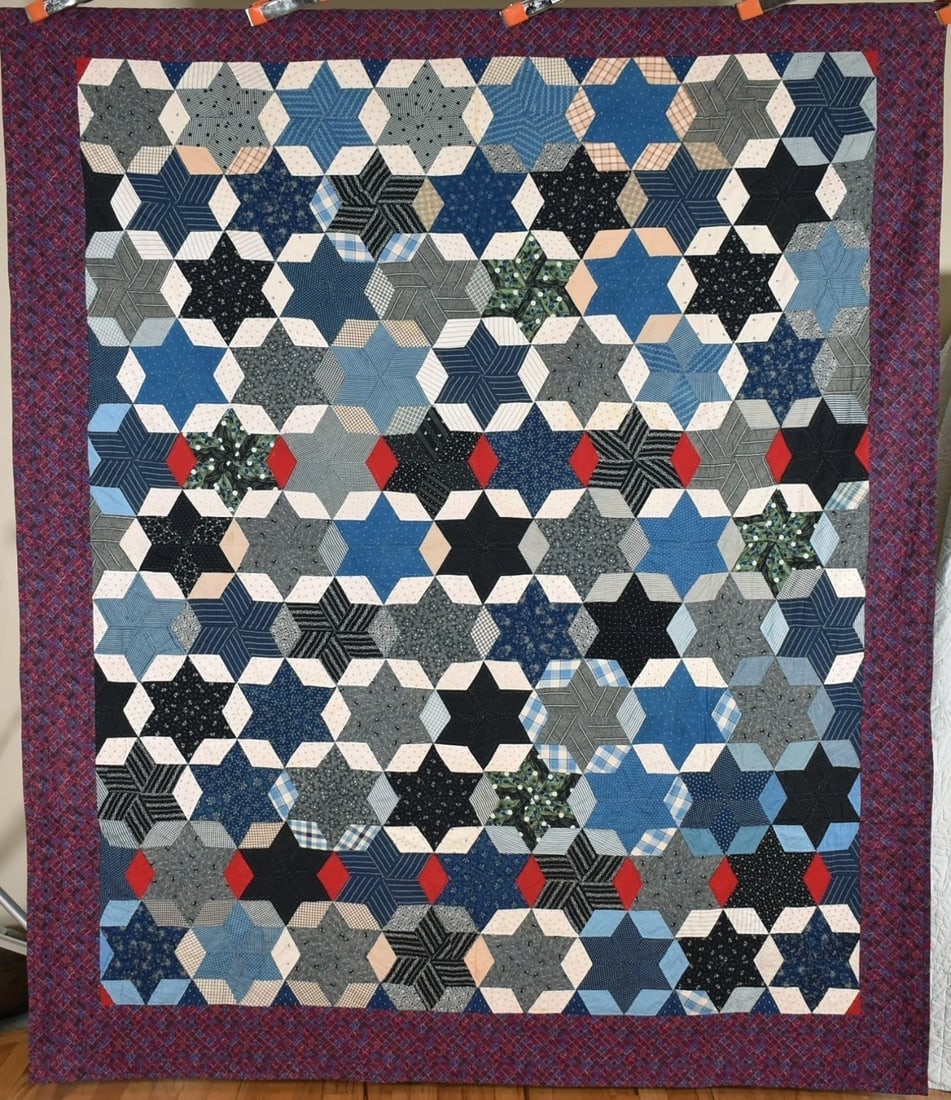 Vintage Touching Stars Quilt: This GORGEOUS cotton touching stars quilt is all hand pieced and hand quilted, with a late 19th century top finished in the 1940's or 1950's (border and back). It measures 72" X 88" and is in excellen