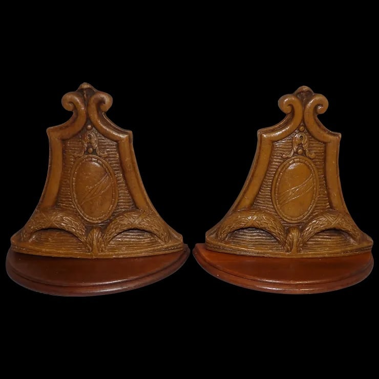 Unique Pair Syroco Wood Composition Bookends: This particular Pair of Syroco Wood Bookends is difficult to find. I do not like to use the word rare but I could not find another pair like them. No chips, loss of color, etc. I did replace the felt