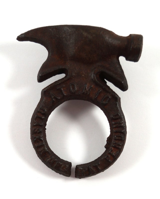 Cowboy Saddle Horn Fence Tool Atomic Glaskin Mfg.: Title: Cowboy Saddle Horn Fence Tool Atomic Glaskin Mfg.Dimension: 4 ¼” tall x 3 ½” wideDate: Ca. 1900-20’s.Additional Information: Rare and unique cast iron tool with