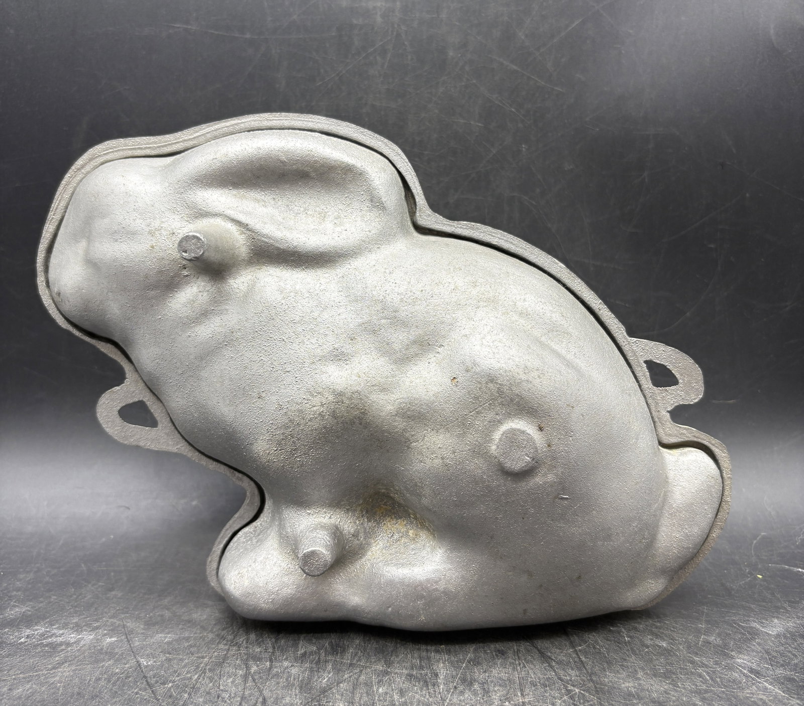 Vintage Cast Aluminum Bunny Rabbit Mold Metal: Date/Period: unknownDimension: Approx. 10" x 7"Material: aluminumAdditional Information: Vintage Cast Aluminum Bunny Rabbit Mold Metal Shipping:Domestic: Flat-rate of $11.00 to anywhere within