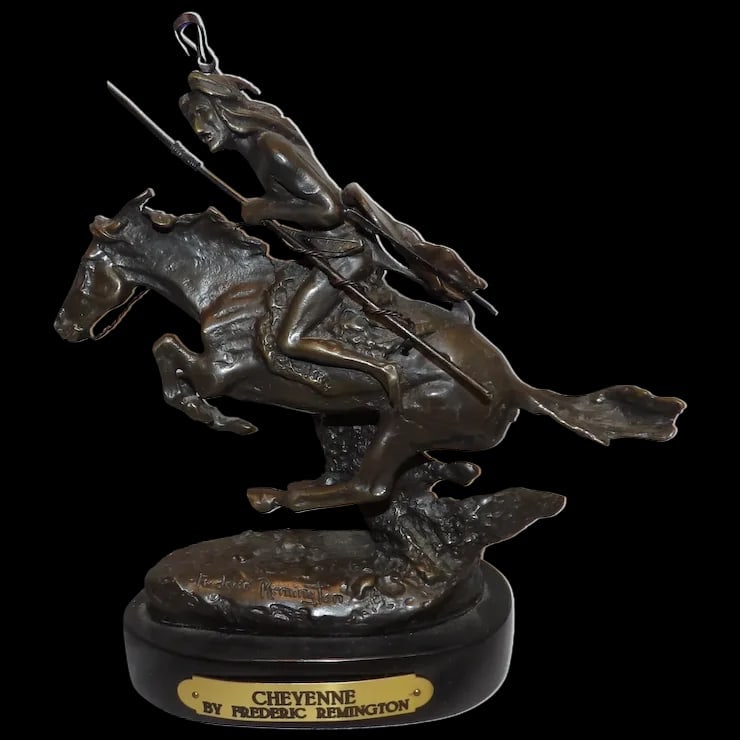 Fredrick Remington Cheyenne Bronze- ASB Casting: This Fredrick Remington Cheyenne Bronze- ASB is the Baby size 8 x 8 x 3 ½” with black marble base. It is in excellent condition. This is a well-done Bronze Replica- very realistic. Before