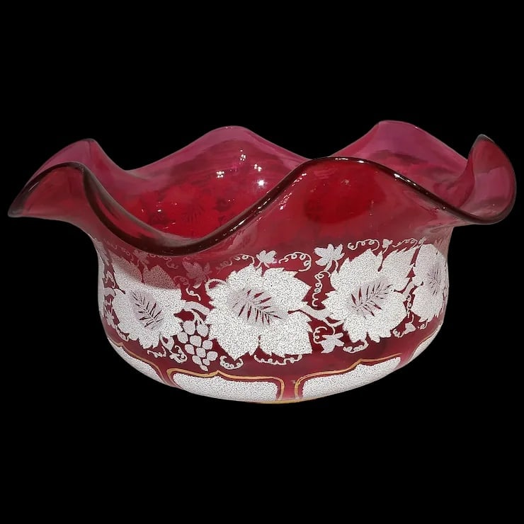 Cranberry Hand-Blown Art Glass Textured Ruffle Top Glass Bowl: This Cranberry Hand-Blown Art Glass Textured Ruffle Top Glass Bowl is in excellent condition. No chips, loss of texture, etc. does have a bubble in the base of bowl from the hand-blown process.