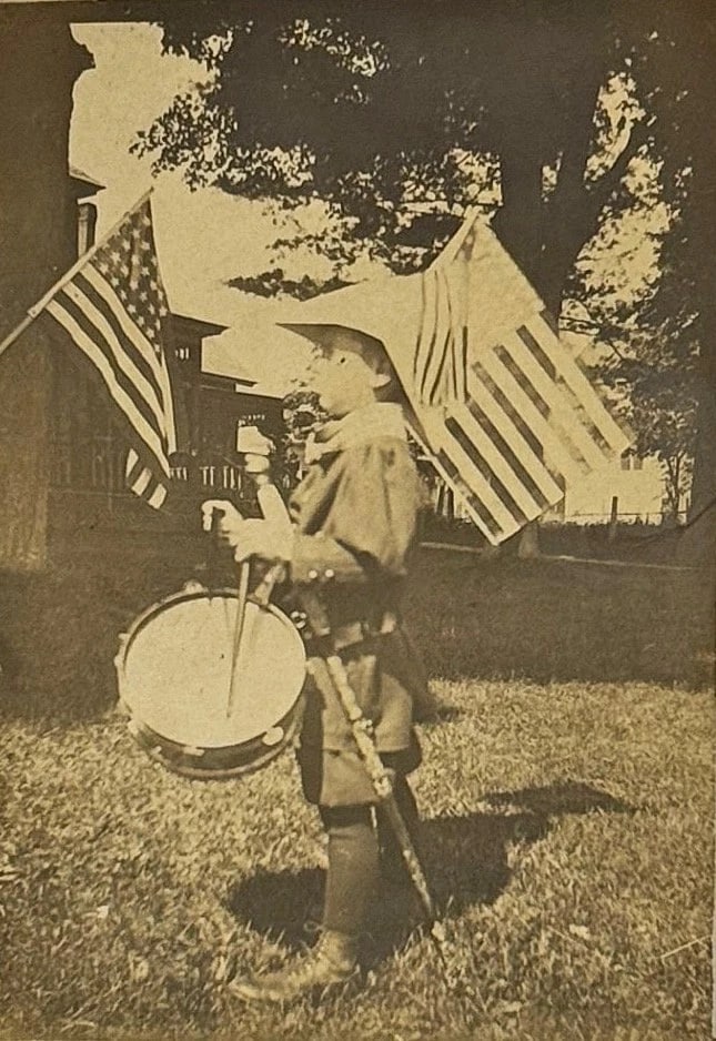 RPPC Patriotic Real Photo Postcard Boy American Flags Sword Drummer Circa 1900: Real photo patriotic postcard of a boy dressed in a uniform playing a drum. He has a large sword on his hip and American Flags on his hat. Probably for a July 4th celebration. Card is in good shape -