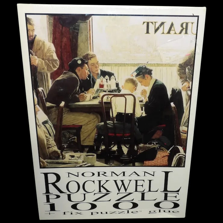 1998 Fink and Co. Norman Rockwell Saying Grace Puzzle Pub by Curtis Pub. Co. NOS: This 1998 Fink and Co. Norman Rockwell Saying Grace Puzzle Pub by Curtis Pub. Co. measures 22.75"X22.75". Still has to original shrink wrap – never opened. It is a 1000 Piece Puzzle with a