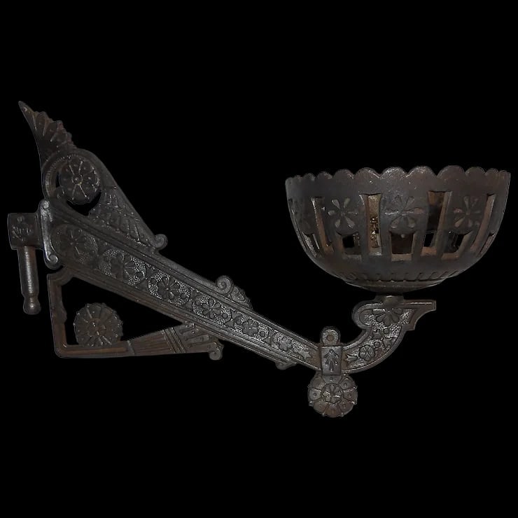 Antique English Cast Iron Lamp or Plant Holder- Diamond Registry Mark: This English Cast Iron Lamp or Plant Holder has a. Diamond Registry Mark on the inside of the holder - this mark was used between 1842-1883. The Registry Mark is hard to read but is obvious. It