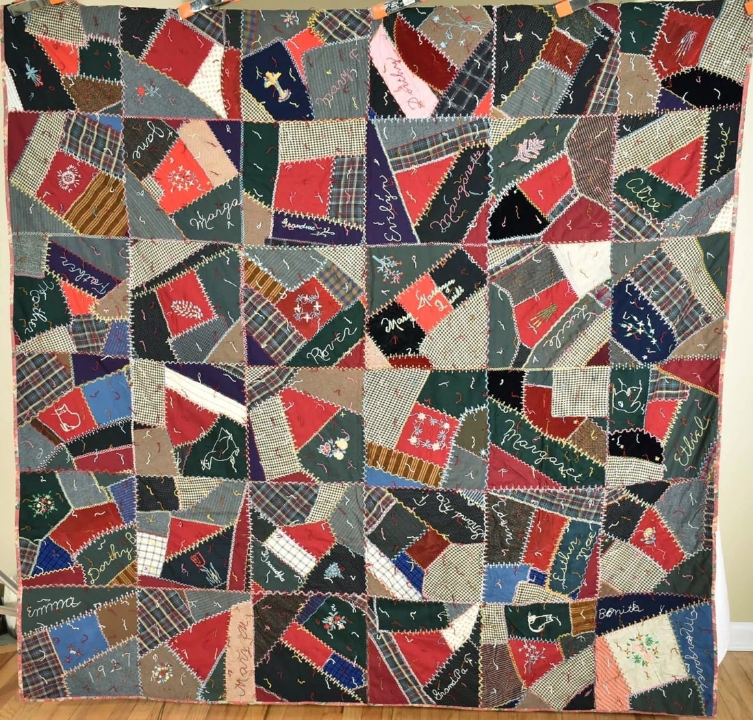 Vintage Wool Crazy Quilt d. "1927": This ELEGANT cotton and wool crazy tied quilt is all hand pieced, with elaborate hand embroidered accents and hatch stitching, and a nice solid red accents. The blocks contain many floral motifs, a