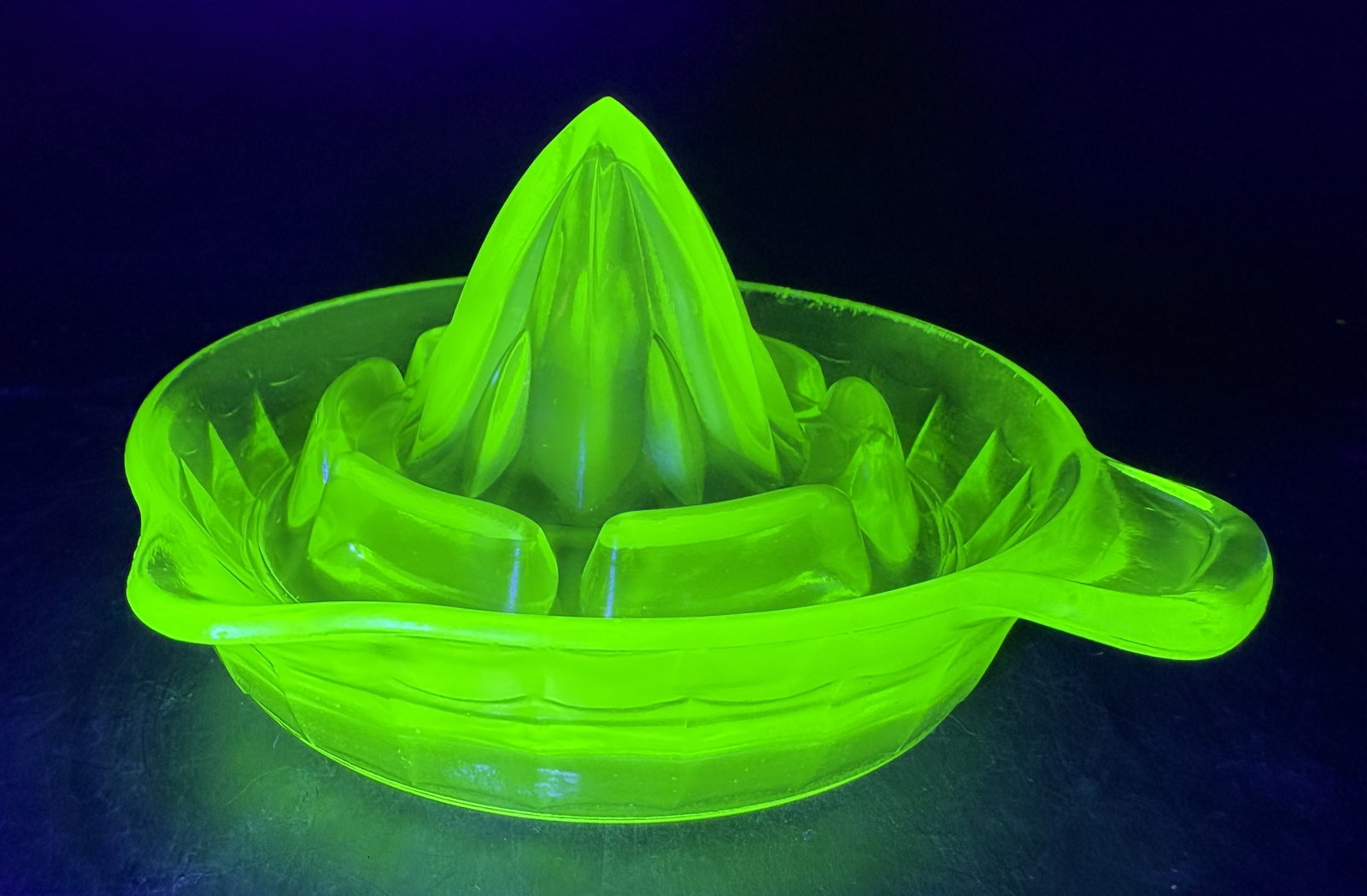 Vintage Green Uranium Glass Orange/Lemon Juicer Reamer with pour spout Glows Perfect: Date/Period: Approx. 1930's Dimension: Approx. 5.5" x 5.25" Material: glass Additional Information: Vintage Green Uranium Glass Orange/Lemon Juicer Reamer with pour spout Glows Perfect Shipping: Domes