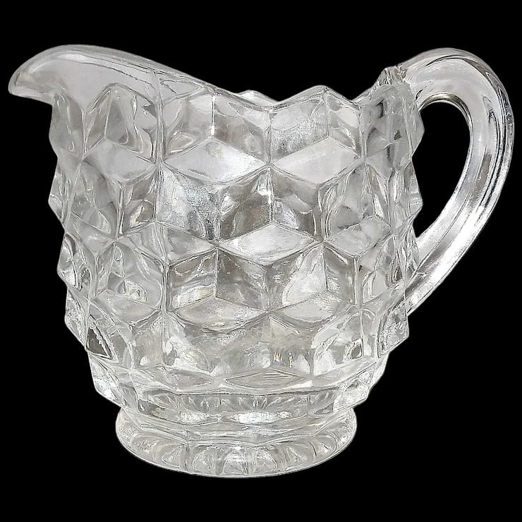 Fostoria American Cubic Clear Glass Creamer: This Fostoria American Cubic Clear Glass Creamer is in excellent condition. NO chips or flea bites. It measures 3 ¾” to 4” -highest point 5 ¼” x 3 3/8”.Item id: