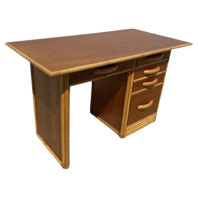 Restored Post-War Hawaiian Koa Wood Desk W/ Rattan Border: Title: Restored Post-War Hawaiian Koa Wood Desk W/ Rattan Border Description: Stacked Koa Wood secretary desk with Koa Wood top and rattan accents, center drawer with four drawers on each side of the
