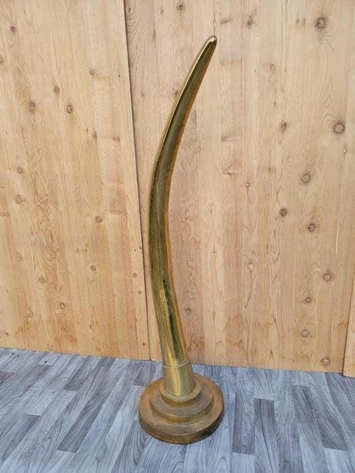 Mid Century Modern Brass Elephant Tusk Horn: Title: Mid Century Modern Brass Elephant Tusk Horn Description: Vintage Mid Century Oversized Brass Elephant Tusk Horn Bold mid century sculpted decorative brass elephant tusk/horn. This impressive
