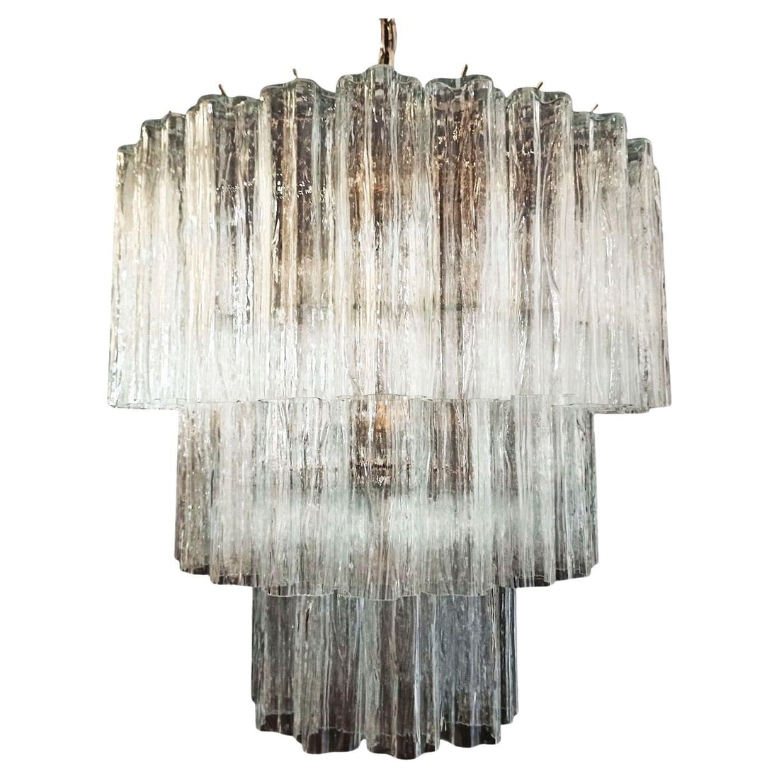Murano Glass Tronchi Pendant Chandelier by Venini: Title: Murano Glass Tronchi Pendant Chandelier by Venini Description: Made in Italy, this gorgeous round chandelier features a brass frame and three tiers of textured glass pendants, known as tronchi