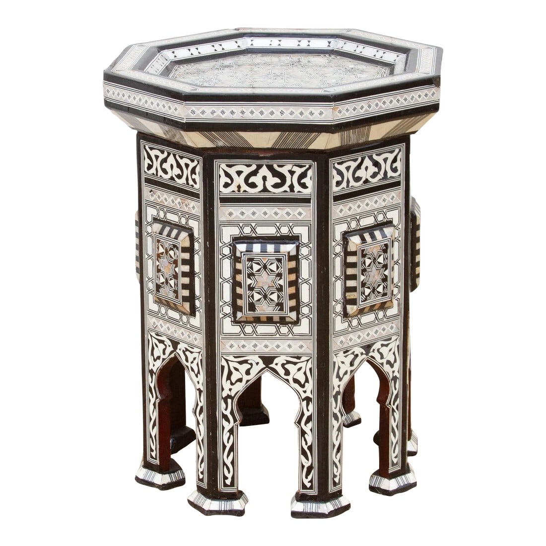 Vintage Black & White Marquetry Side Table: Masterfully constructed, this vintage exotic side table boasts splendid marquetry inlaid work using mother of pearl. The octagonal top on this black and white marquetry table lifts up to offer some st