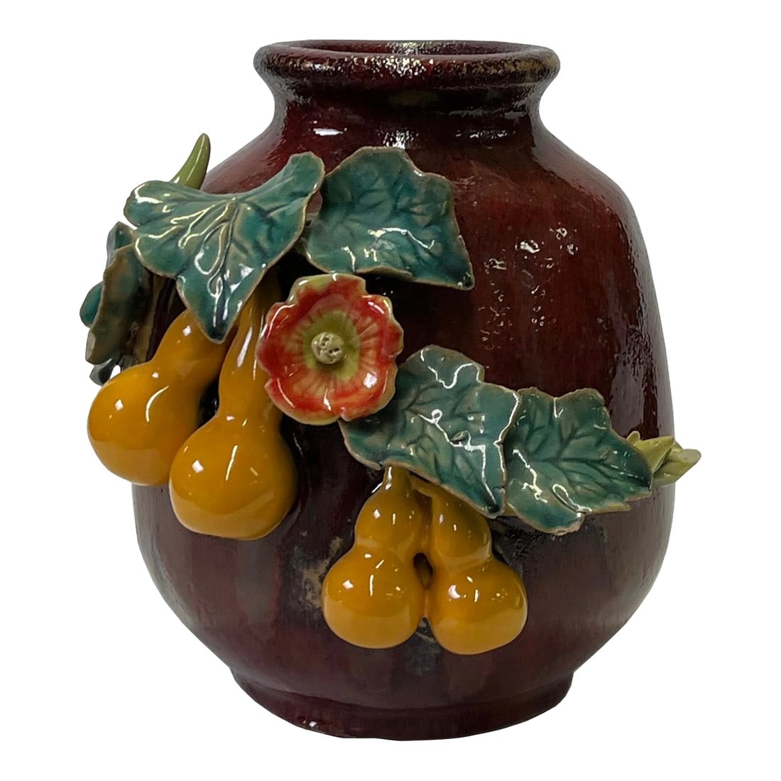 Chinese OxBlood Red Glaze Dimensional Flower Gourd Motif Vase: This is a Chinese decorative brush holder/pot in oxblood red color glaze finish. The theme is a dimensional colorful flower and gourd accent. Dimensions: Dis 6.5" x h6.5" Origin: China