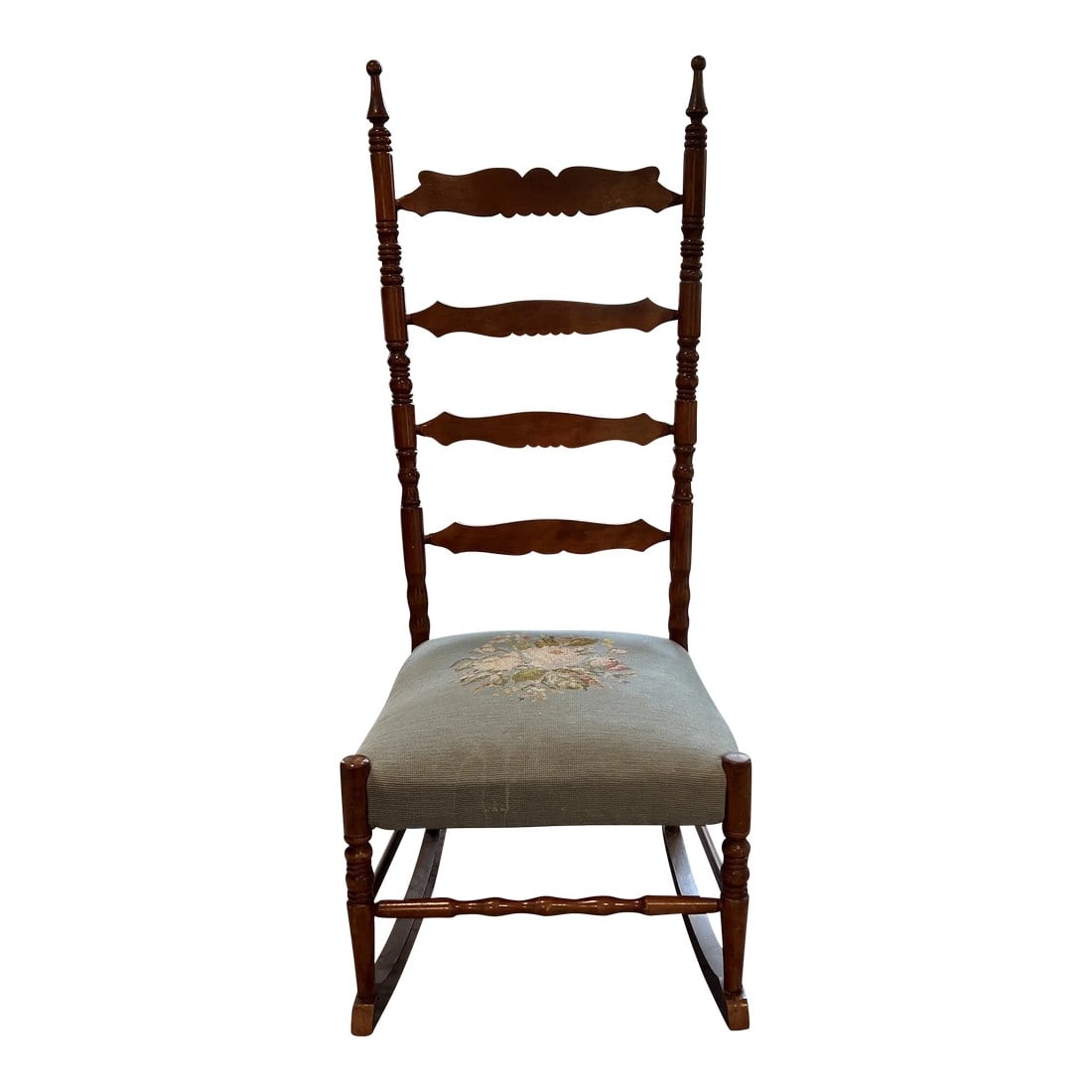 Antique Needlepoint Rocking Chair: Very sweet and comfortable antique rocking chair with needlepoint seat. Condition: Alterations: Original Condition Unaltered Imperfections: Some Imperfections Condition Notes: Beautiful condition.