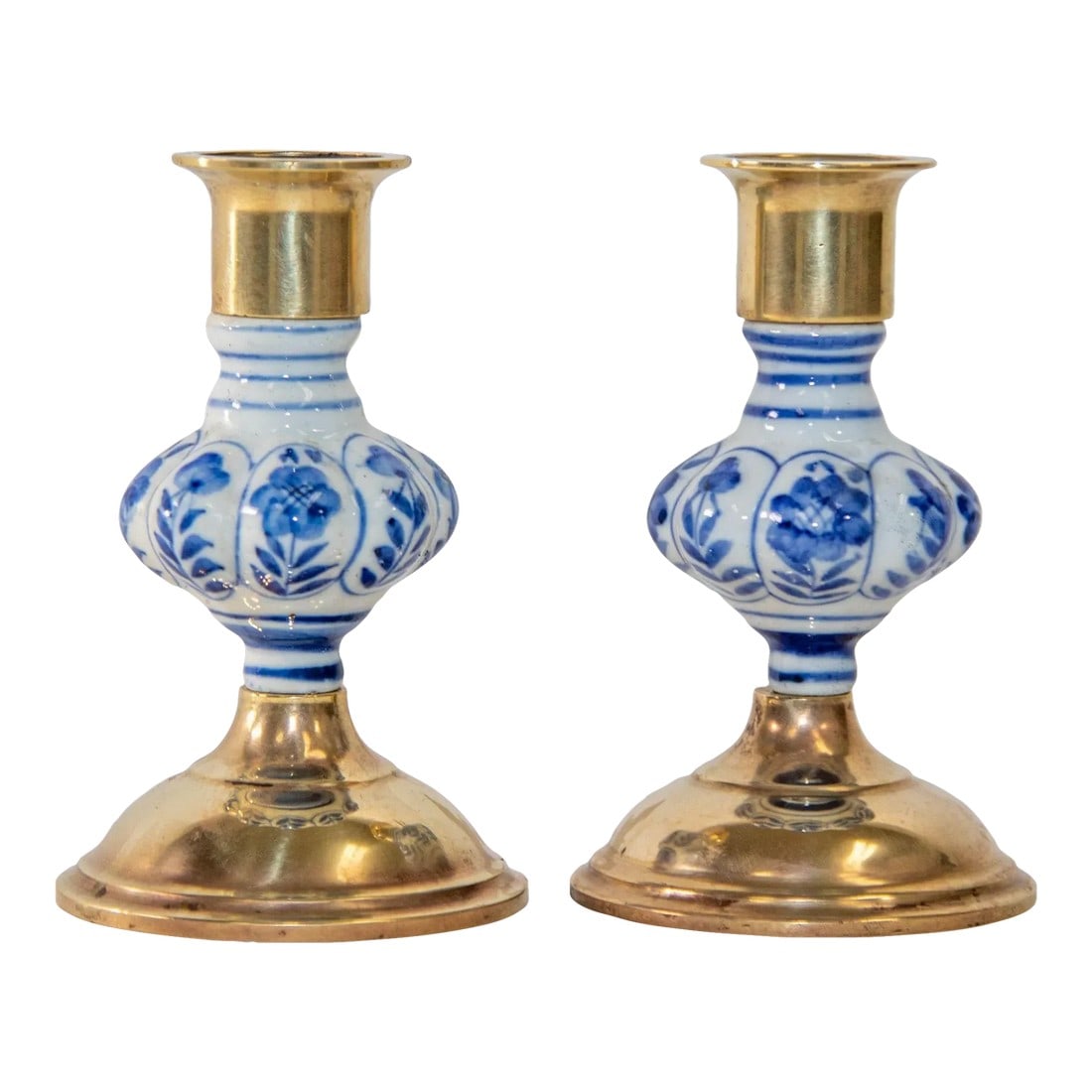Vintage Delft Floral Blue and White Ceramic and Brass Candlesticks, a Pair 1950s: Vintage Blue and White Delft and Brass Hand Painted Candle Holder, 1950s.Hand painted Delft Floral Blue and White Ceramic and Brass Candlesticks, a PairThe pair of brass candle holders is nicely