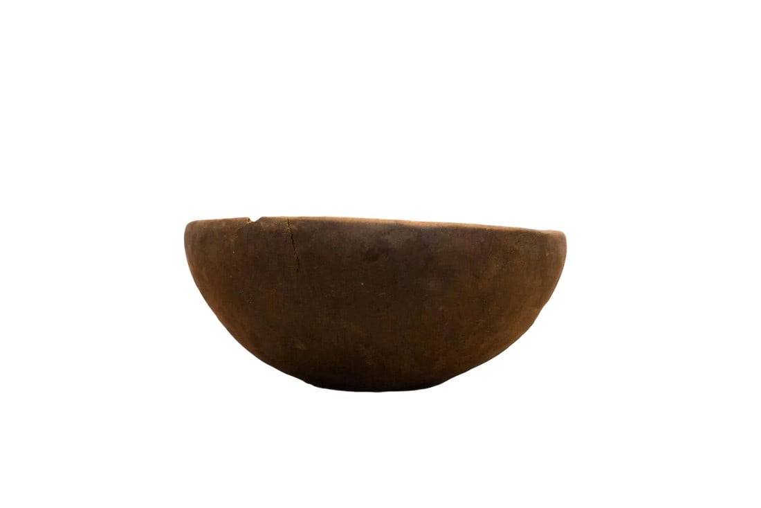 Vintage Wooden African Bowl: :: Hand-carved wood primitive vintage African bowl with tons of character and charm. Please note this is an aged and lived with item, it has cracks, repairs, chips and imperfections. Condition: