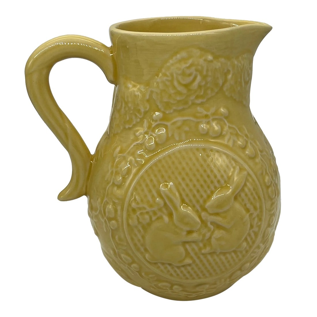 Bordallo Pinheiro Yellow Bunny Rabbit Pitcher: Bright yellow pitcher with bunny rabbits on the front and back. Made in Portugal by Bordello Pinheiro. Imagine this price on your Easter or spring table! The bright yellow would be gorgeous to